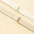 A close-up of two elastic bra straps in beige and white, featuring adjustable sliders for a custom fit and reduced pressure.