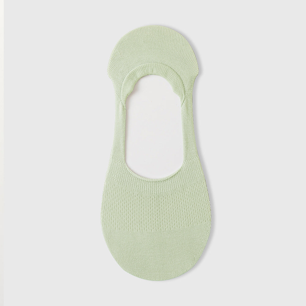 Mint green no-show sock liner with textured design and comfort band, displayed flat