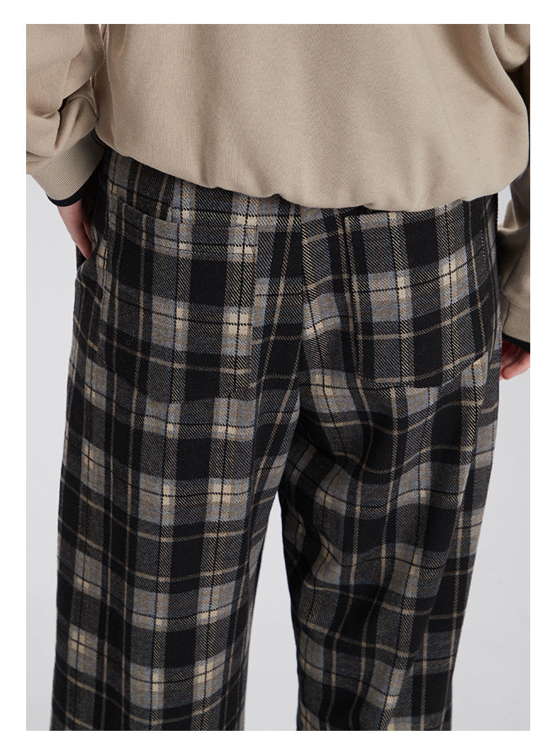 Fabric detail showing plaid pattern and tailored fit