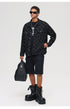 Urban streetwear look with checkered jacket, cargo shorts and platform boots
