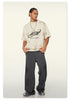 Frontal shot of model in oversized Beattube t-shirt with textured print