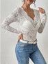 lace long sleeve top styled with jeans