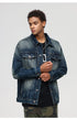 Close-up portrait of male model in denim jacket and black t-shirt