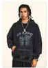 Rear view of model in black hoodie with braided hair, showing NE2C logo