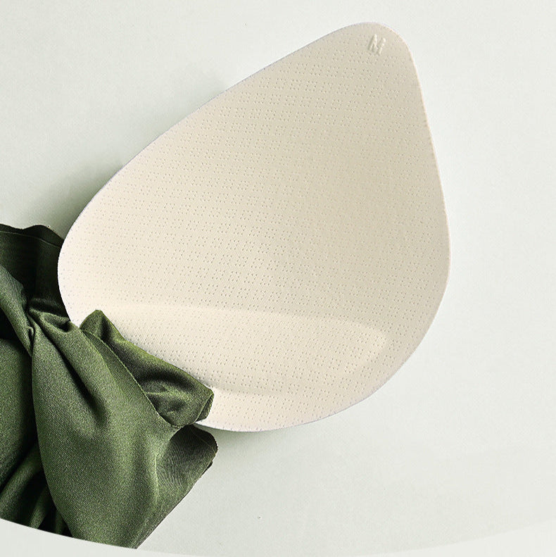 Close-up of a 3D breathable bra pad, designed for natural shaping and support.