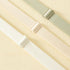 Three elastic adjustable bra straps in cream, beige, and green, showcasing high-stretch material for comfort.