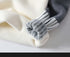 Close-up of gray striped cuff detail"
