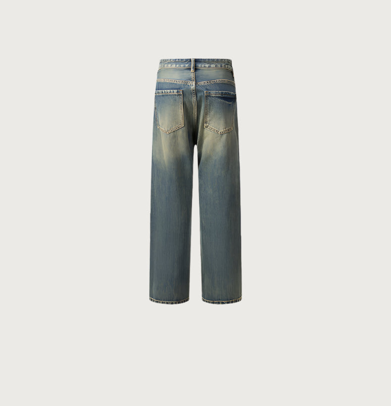 Back view of vintage wash wide leg jeans showing traditional pocket placement and fading detail