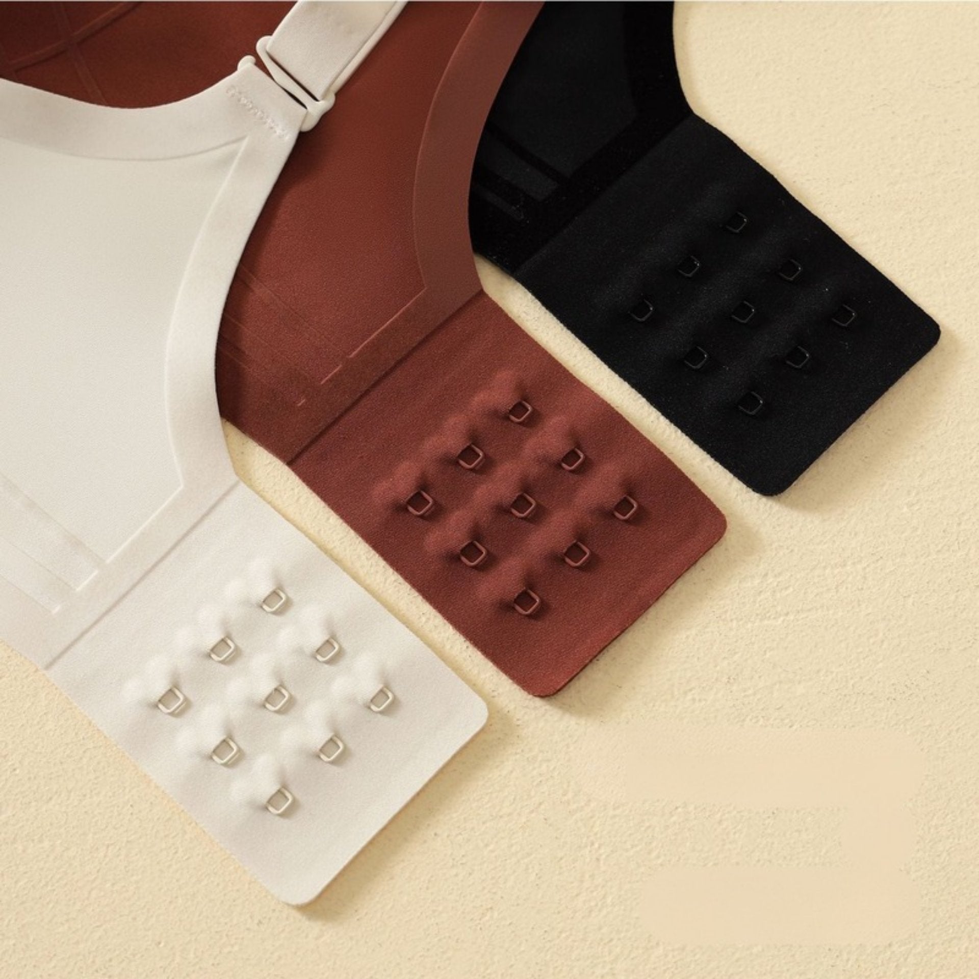 Three color options of seamless back hook closures for an adjustable, pressure-free fit.