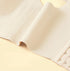 A smooth, stretchable beige bra side panel designed to flatten underarm fat and provide breathable comfort.