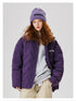 Woman with curly red hair wearing purple Aesthetic puffer jacket paired with matching knit beanie and khaki pants