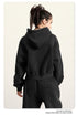 Black cropped hoodie, back view