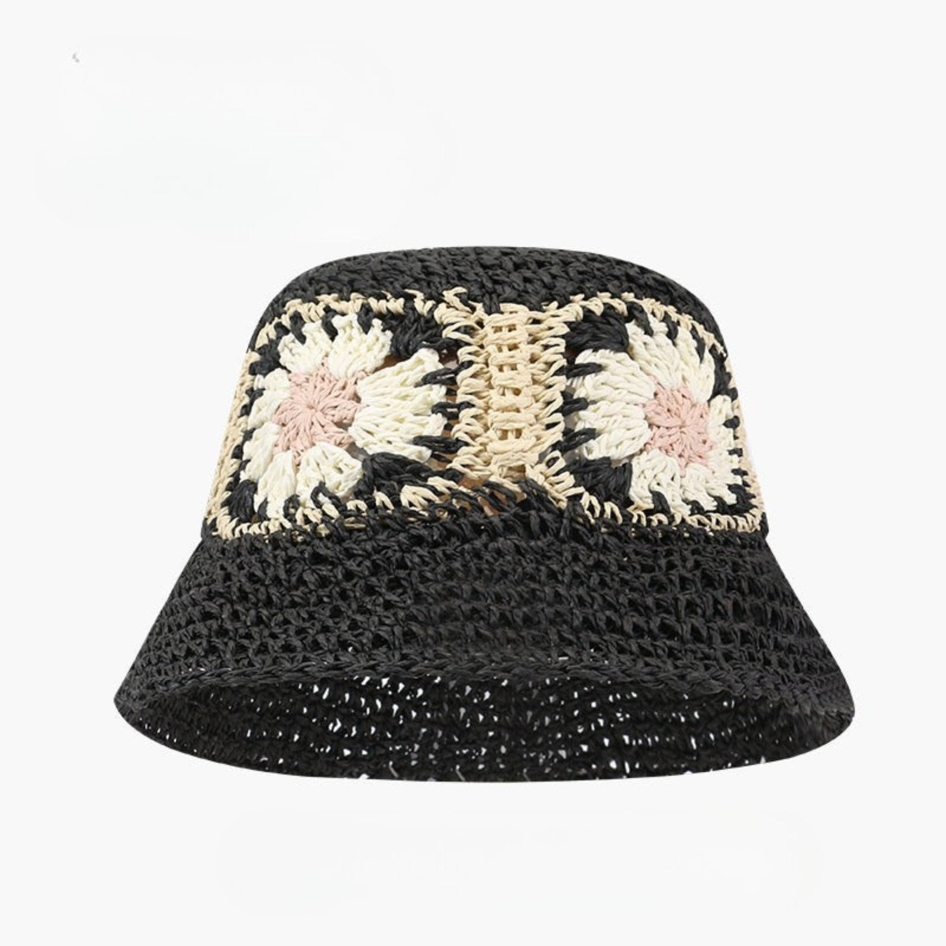 Black crochet bucket hat with cream and beige granny square floral designs, labeled UPF50+ for sun protection.