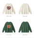Front and back product views of sweaters in white and forest green