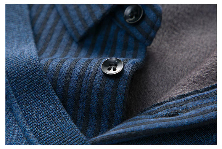 Close-up of button closure on striped collar