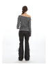 Back view of striped off-shoulder sweater with dropped shoulders