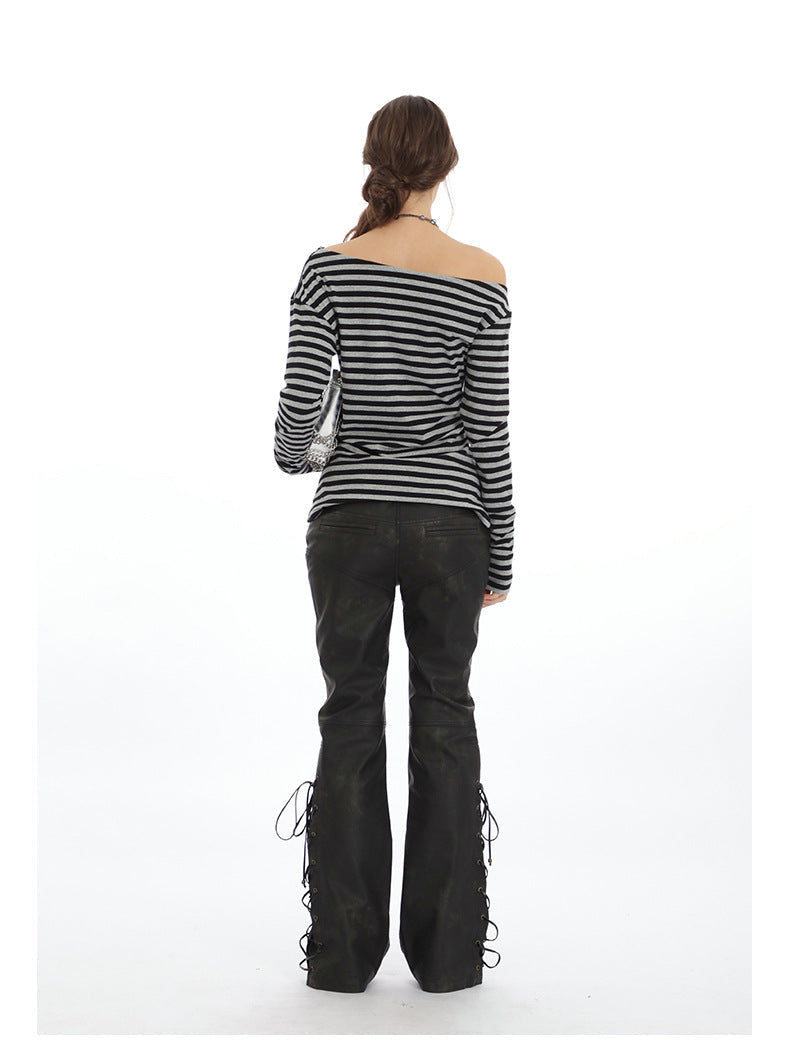 Back view of striped off-shoulder sweater with dropped shoulders