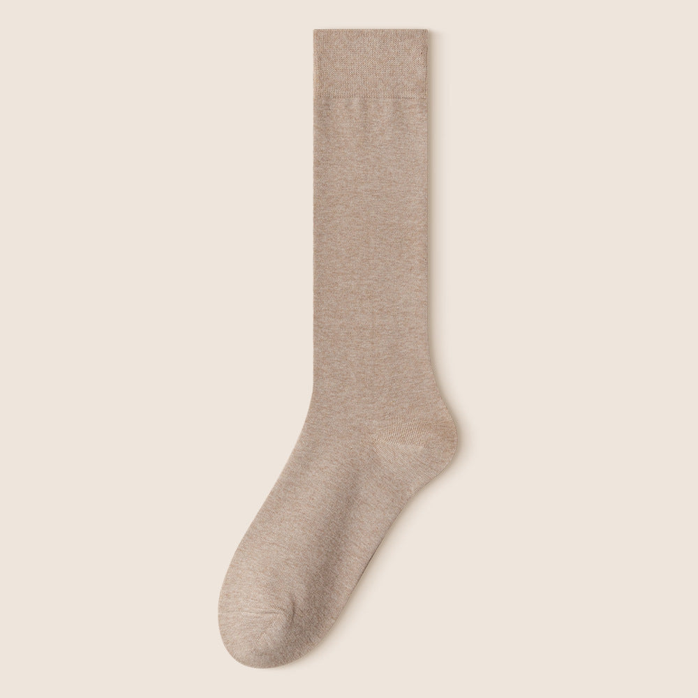 Single oatmeal/beige knee-high sock displayed against cream background