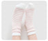 White knee-high fuzzy socks with delicate pink stripe pattern