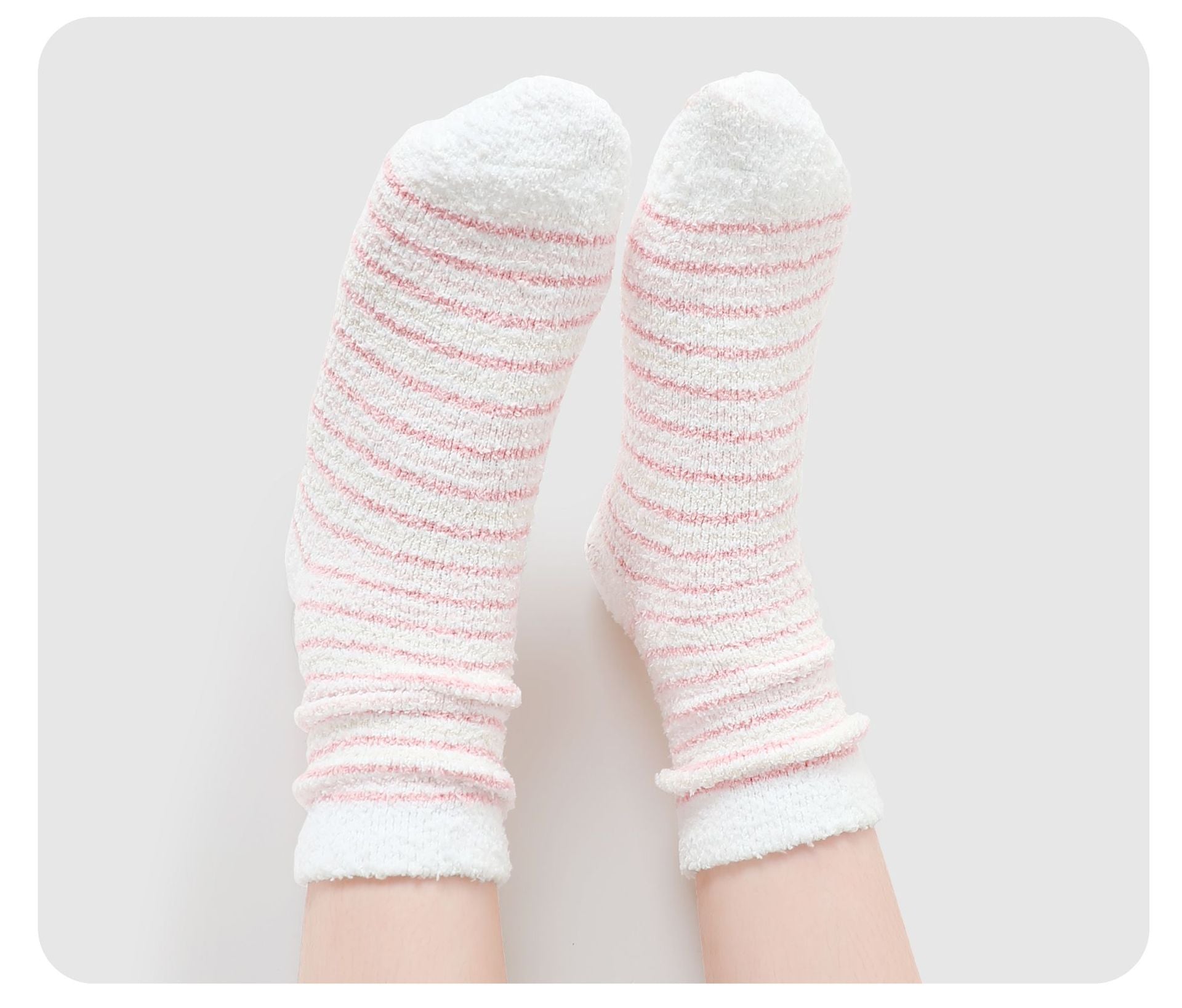 White knee-high fuzzy socks with delicate pink stripe pattern