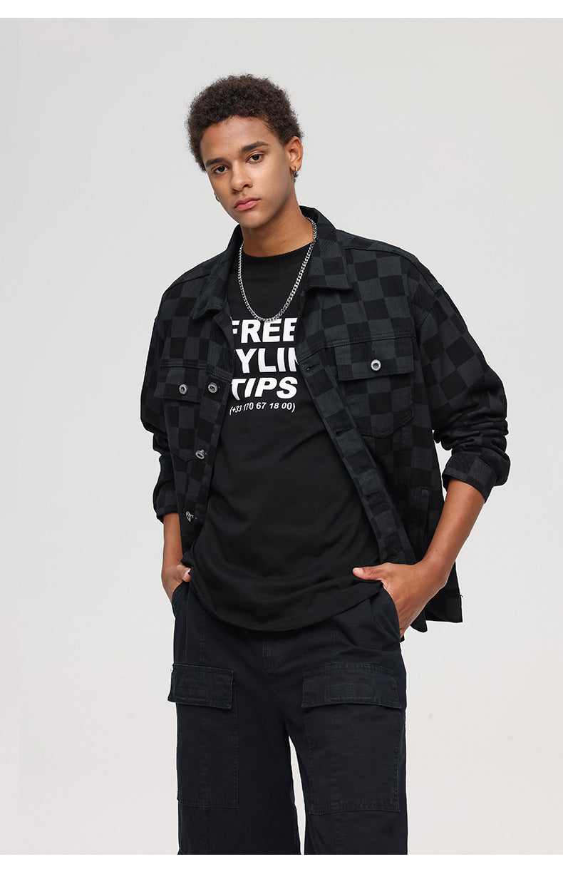 Casual streetwear outfit with checkered jacket and printed t-shirt