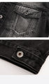 Detailed shots of the front pocket stitching and metal button hardware on the black washed denim jacket