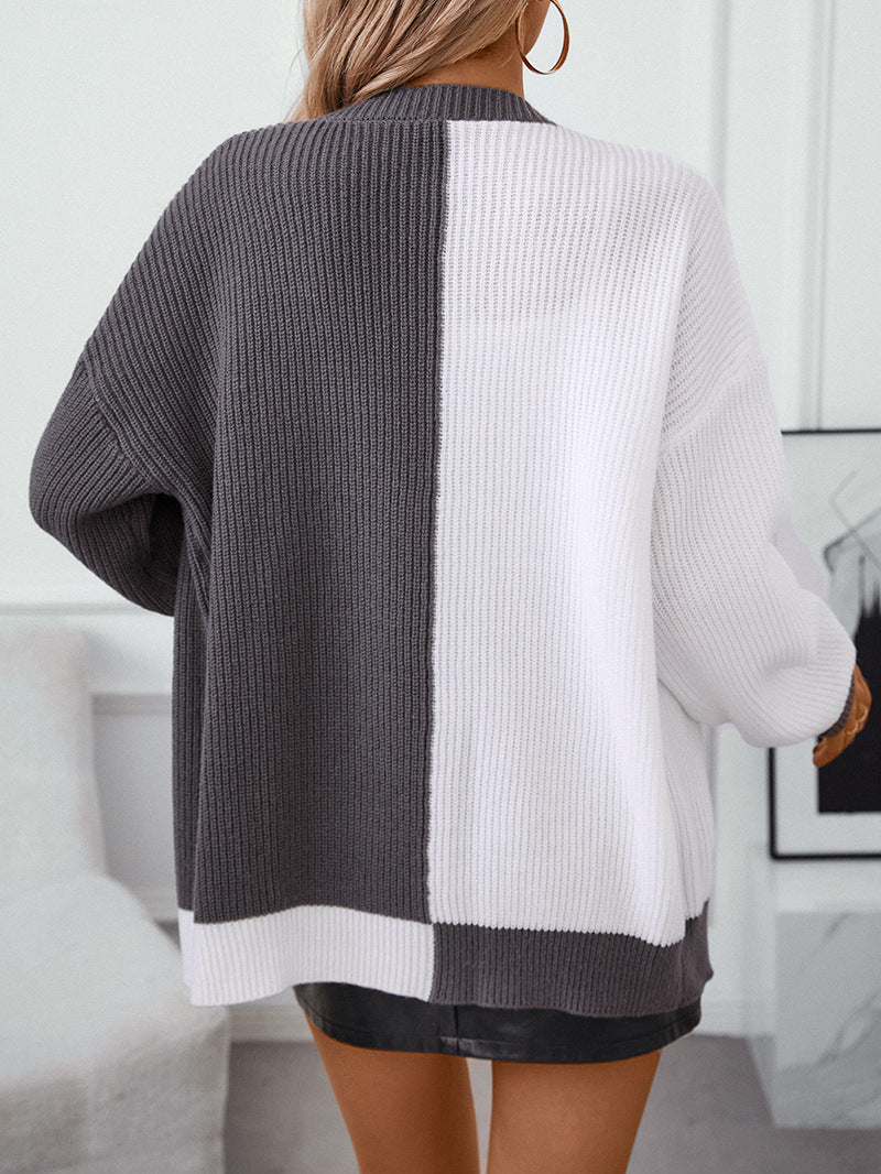 Back view of split-design cardigan showing vertical gray and white color blocking