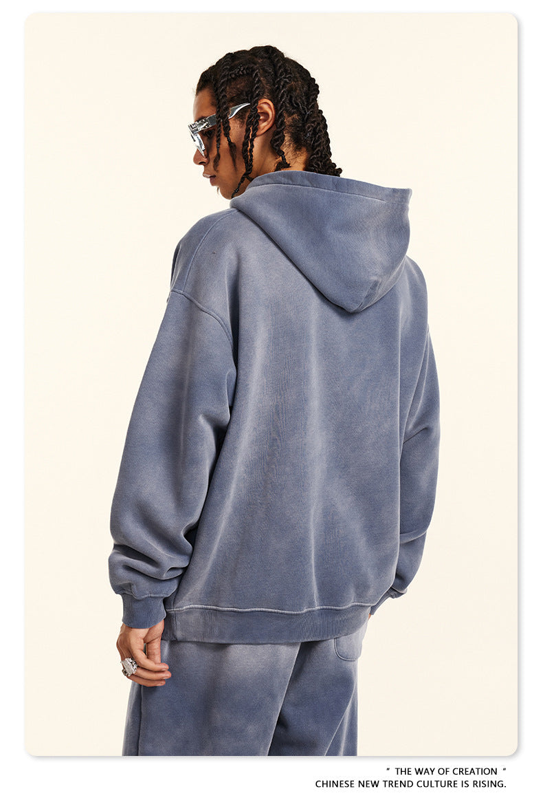 Back view of gray oversized hoodie showing plain back design and relaxed fit