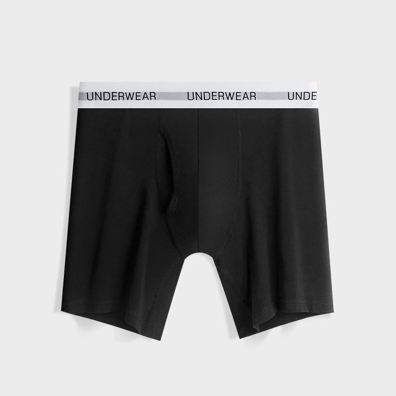 Black boxer briefs with "UNDERWEAR" waistband, showcasing a modern, comfortable cut