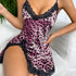 A model wearing pink leopard print satin slip dress with black lace trim, shown from chest up against white background