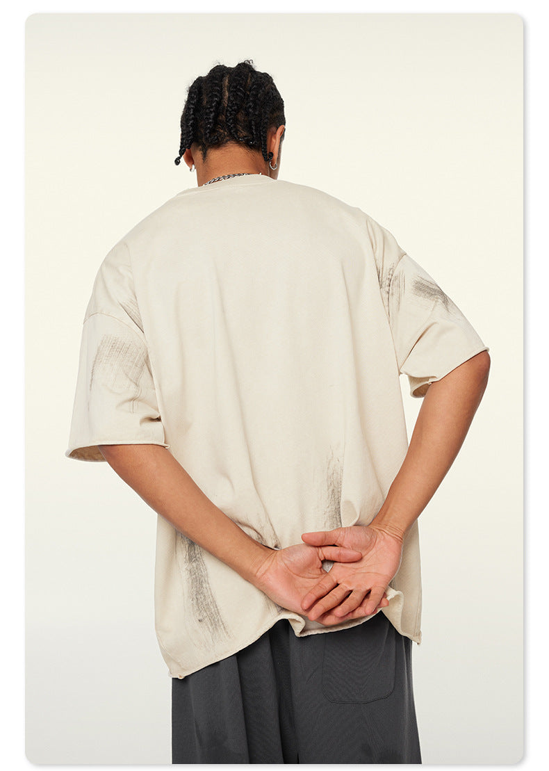 Rear perspective of loose-fitting Beattube t-shirt with distressed texture