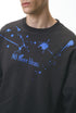 Close-up of gray "NO More Ideas" graphic print on long sleeve t-shirt