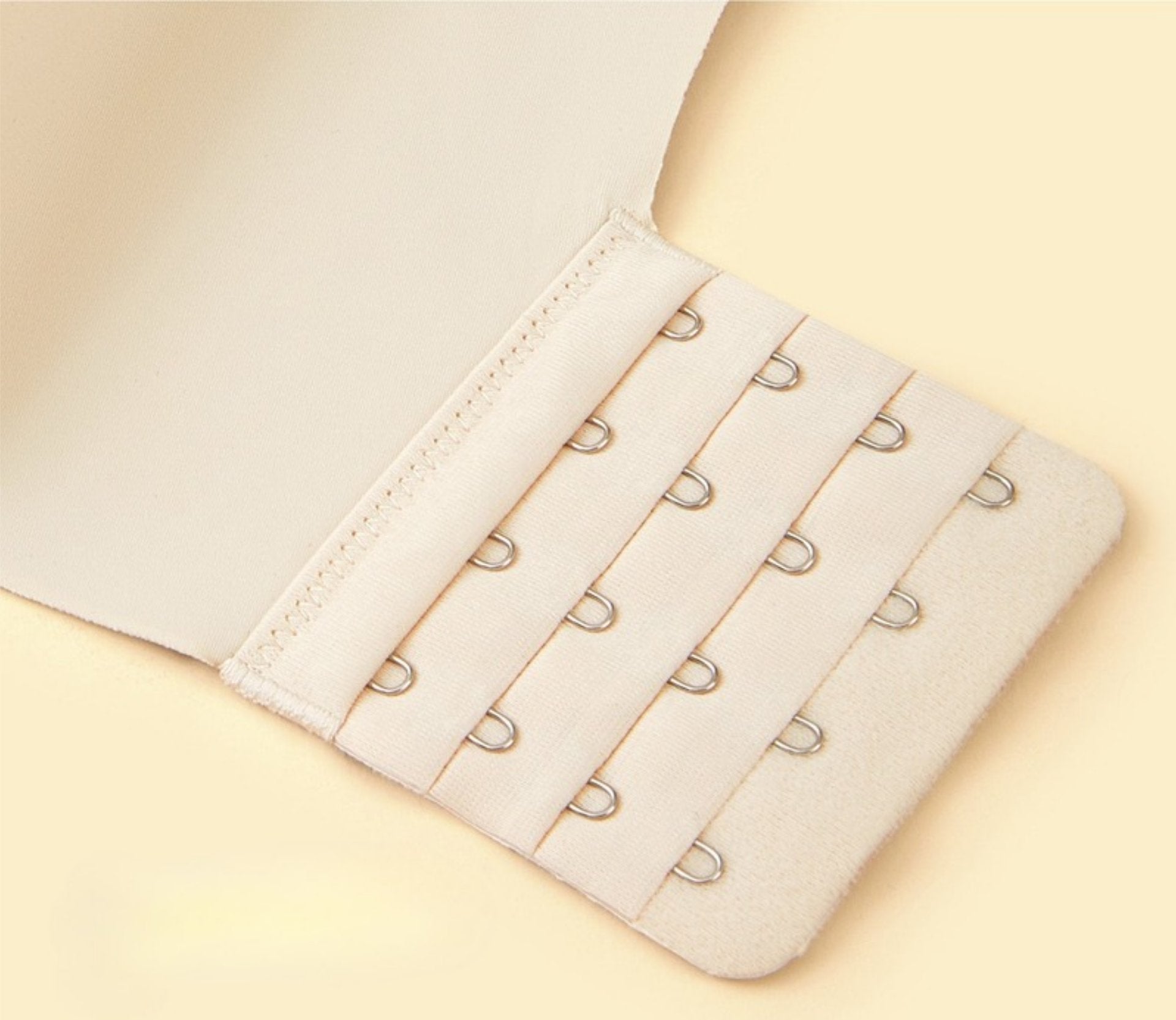 A close-up of the bra’s four-row, four-hook back closure, ensuring a customizable fit and secure support.