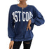 Close-up of navy sweatshirt showing East Coast text and gold chain detail