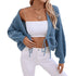 Cropped cardigan in blue with tie front detail, white crop top and high-waisted pants ensemble