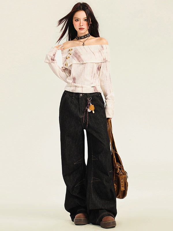 A woman is posing in a cream off-shoulder button top with black wide-leg jeans, leather choker, and brown messenger bag on light background
