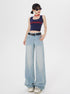 Front-facing model in navy MLYNARCIN tank, wide-leg jeans, red choker, and sunglasses on white background