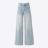 Product shot of light wash wide-leg jeans laying flat, showing high-waist design and full-length silhouette