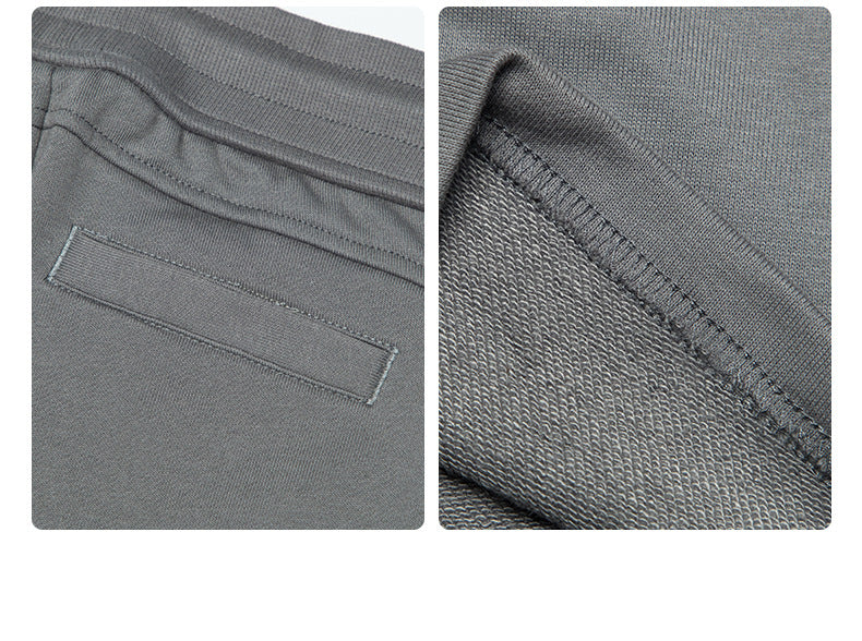 Close-up of gray sweatpants showing pocket construction and interior fabric texture