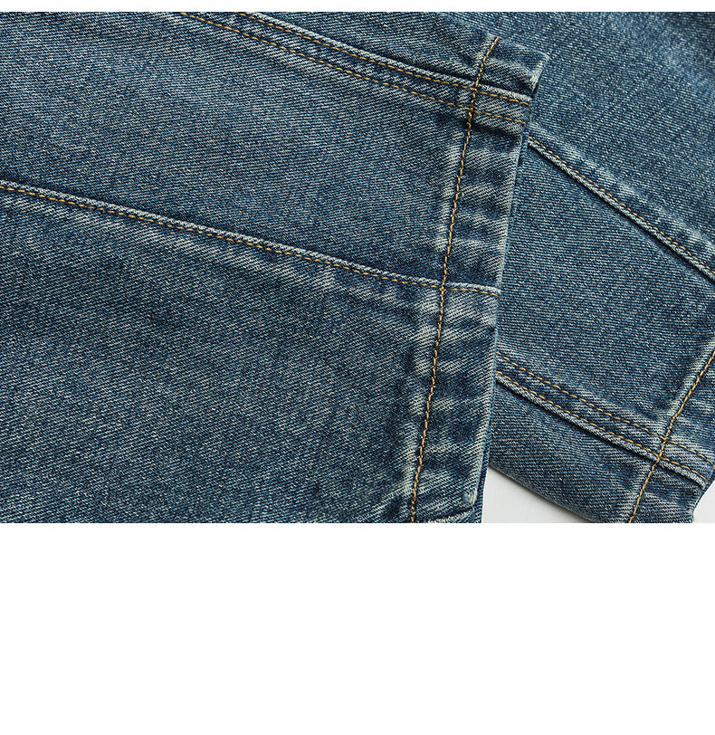 Full product photo of relaxed-fit black denim jeans with tapered legs and three-button waistband closure