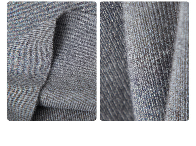 Extreme close-up of grey sweater's knit texture and fabric draping, showing detailed ribbed pattern.