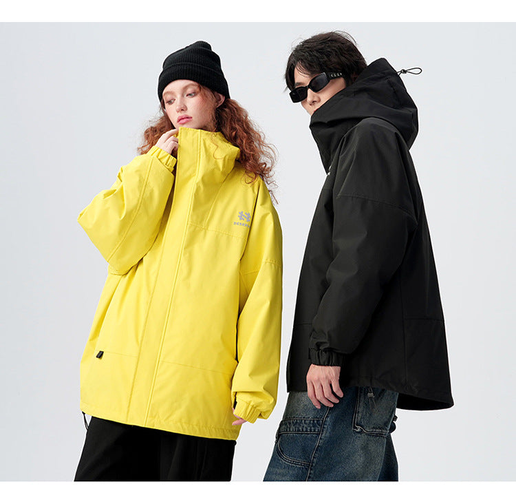 Yellow and black urban jackets with Deserve logo, featuring waterproof shell and front zipper closure, shown in lifestyle product shots
