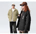 Models posing in ASTROSMASH streetwear with matching puffer jackets - olive and black versions with white branding and caps