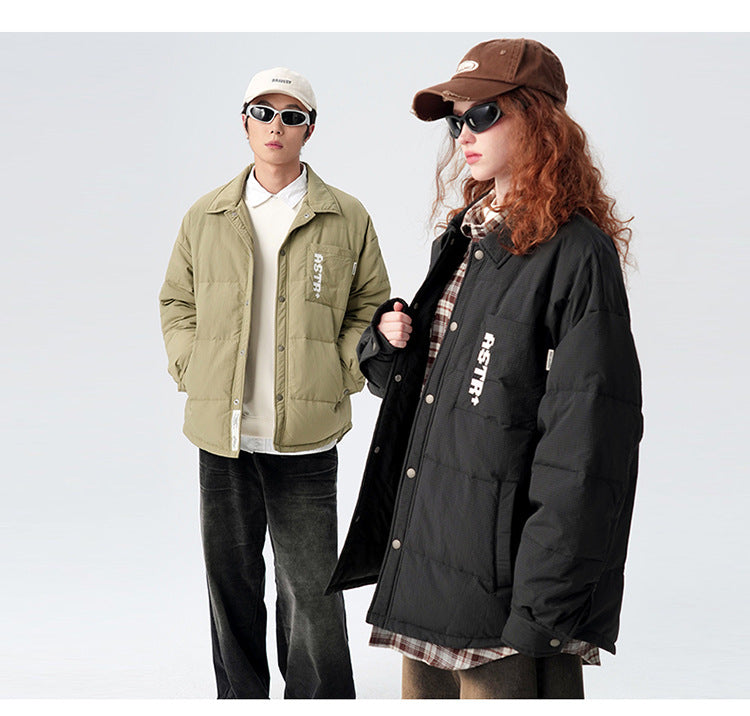 Models posing in ASTROSMASH streetwear with matching puffer jackets - olive and black versions with white branding and caps