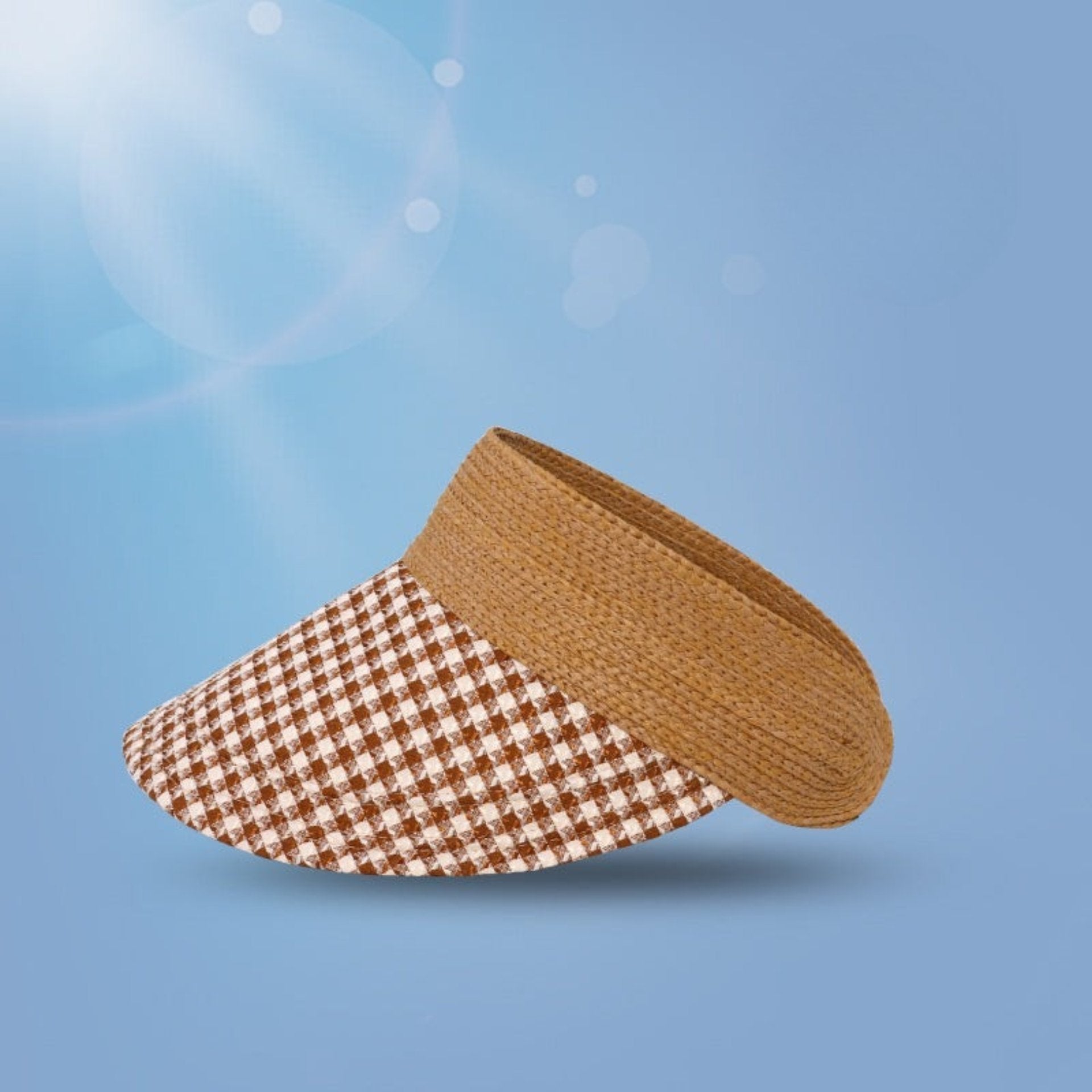 A brown woven straw visor with a brown and white checkered brim, showcasing its wide brim and UPF 50+ sun protection feature.