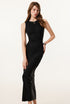 Female model in a black sleeveless bodycon maxi dress, styled with a silver necklace for an elegant and sleek look.