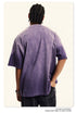 Side profile of Breaking Tradition purple tee with metal-inspired logo and comfortable relaxed fit