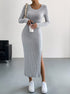 Light gray ribbed long-sleeve maxi dress with side slit, styled with white sneakers for casual chic look