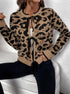 Model wearing tan and black leopard print cardigan with front tie closure and ribbed trim, styled with black pants