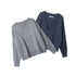 Two knit sweaters with distressed hems - one in grey with crew neck, one in navy with deep V-neck. Both featuring ribbed trim and brand labels.